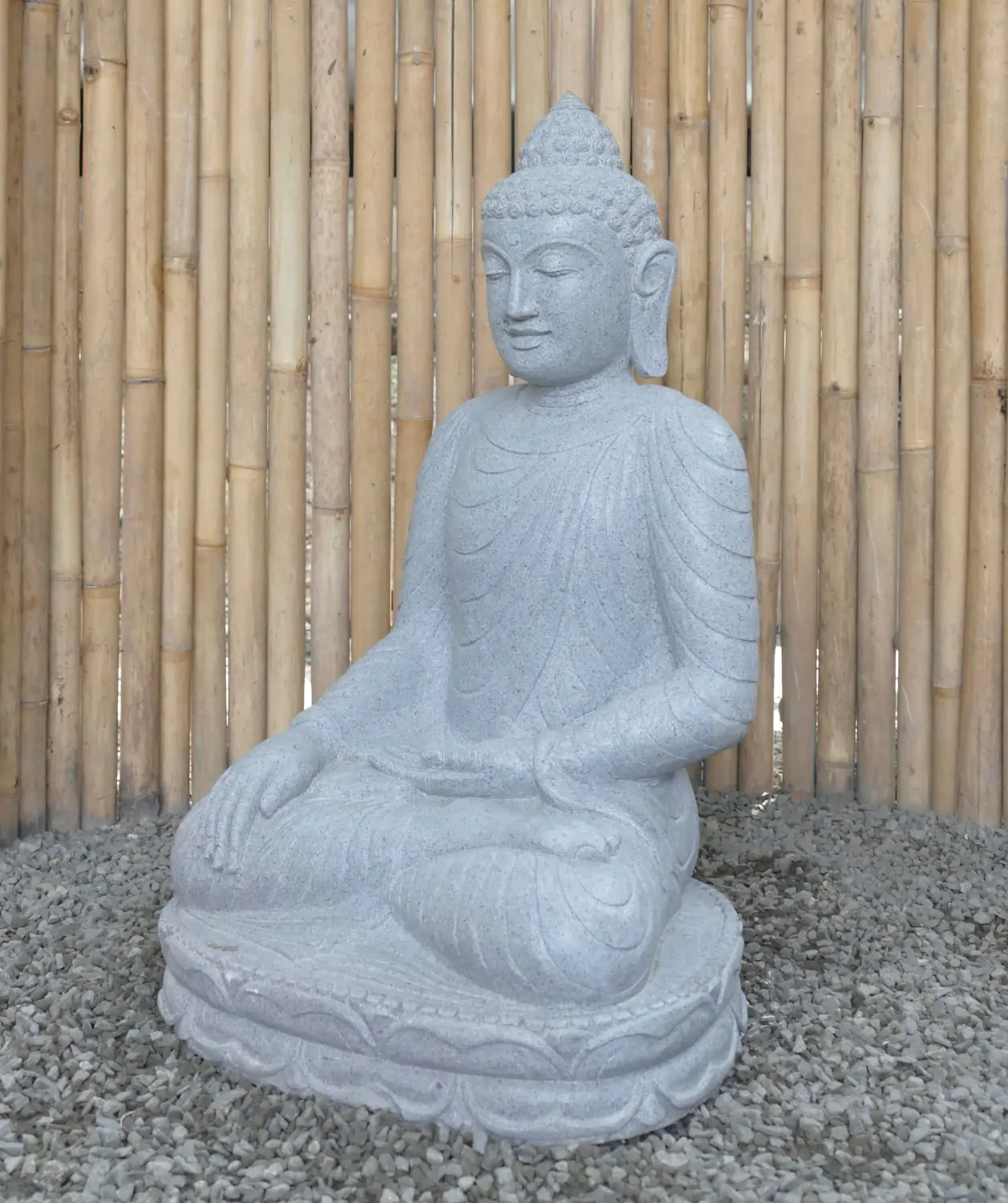  Product image 3 of the product “Seated Buddha made of Riverstone in Bhumisparsha - gesture of touching the earth. 83cm height. ”